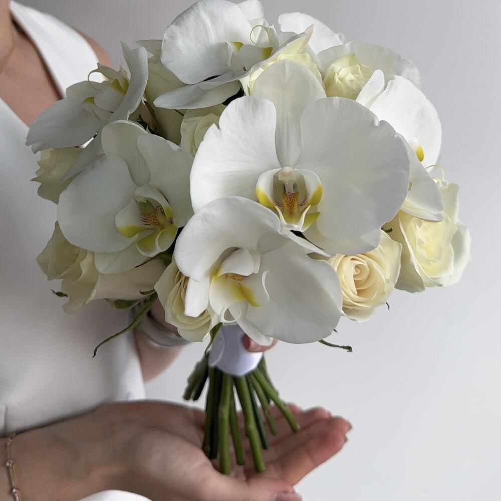 Wedding bouquet with orchids and cream roses 2